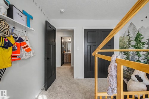 Bedroom with light colored carpet and baseboards - 34 Riverhill Crescent, St. Albert, AB - Indoor Photo Showing Other Room