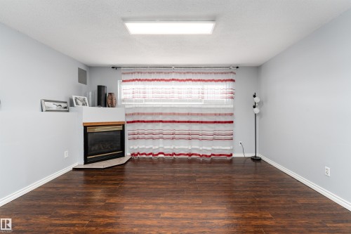 3505 42 Street, Leduc, AB - Indoor Photo Showing Other Room With Fireplace