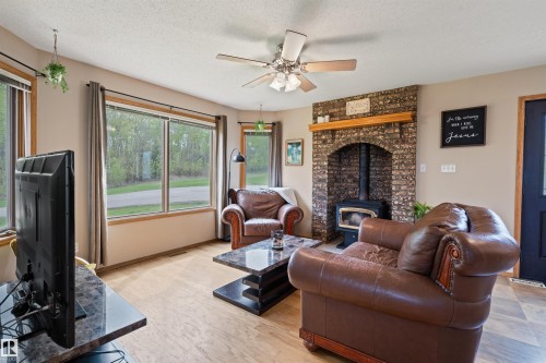 1301 28 Street, Cold Lake, AB - Indoor Photo Showing Living Room With Fireplace