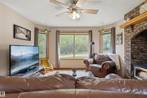 1301 28 Street, Cold Lake, AB - Indoor Photo Showing Living Room With Fireplace