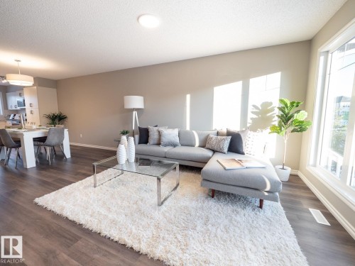 50 Brougham Drive, Ardrossan, AB - Indoor Photo Showing Living Room