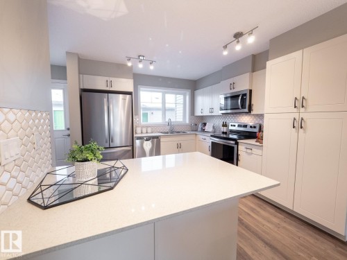 50 Brougham Drive, Ardrossan, AB - Indoor Photo Showing Kitchen With Stainless Steel Kitchen