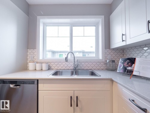 50 Brougham Drive, Ardrossan, AB - Indoor Photo Showing Kitchen With Double Sink