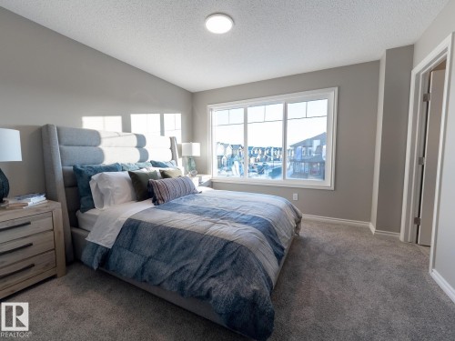 50 Brougham Drive, Ardrossan, AB - Indoor Photo Showing Bedroom