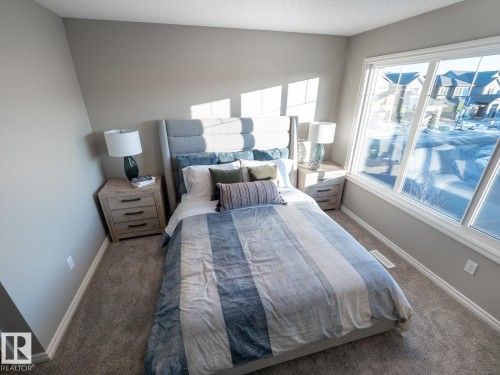 50 Brougham Drive, Ardrossan, AB - Indoor Photo Showing Bedroom