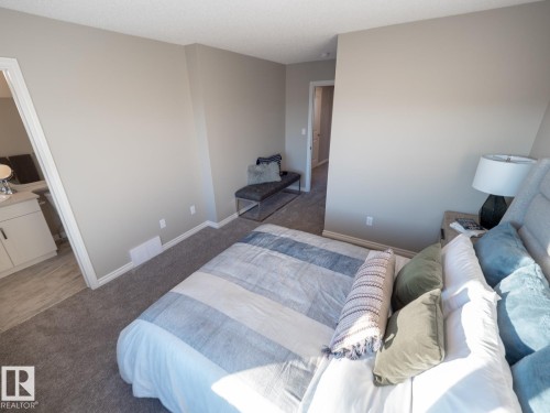 50 Brougham Drive, Ardrossan, AB - Indoor Photo Showing Bedroom