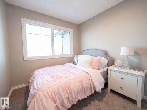 50 Brougham Drive, Ardrossan, AB - Indoor Photo Showing Bedroom