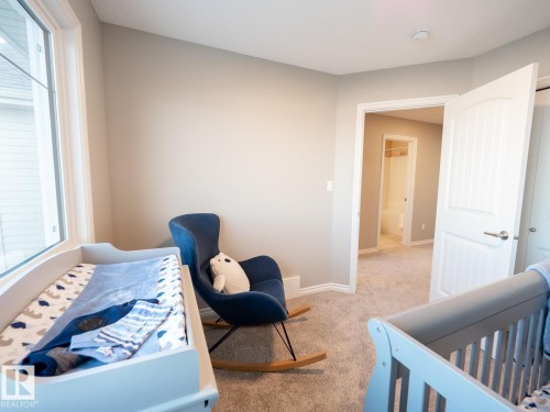 50 Brougham Drive, Ardrossan, AB - Indoor Photo Showing Bedroom