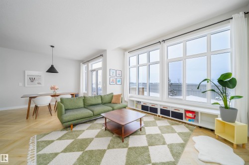 Living area with parquet flooring and baseboards - 15 Chambery Crescent, St. Albert, AB - Indoor Photo Showing Living Room