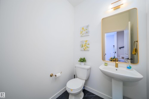 Bathroom featuring toilet and baseboards - 15 Chambery Crescent, St. Albert, AB - Indoor Photo Showing Bathroom