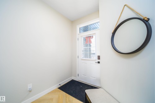 Doorway featuring parquet floors and baseboards - 15 Chambery Crescent, St. Albert, AB - Indoor Photo Showing Other Room