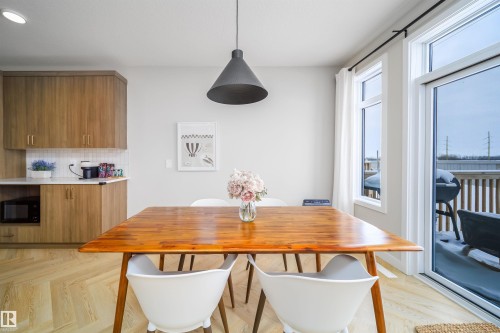 Dining space featuring parquet floors - 15 Chambery Crescent, St. Albert, AB - Indoor Photo Showing Dining Room