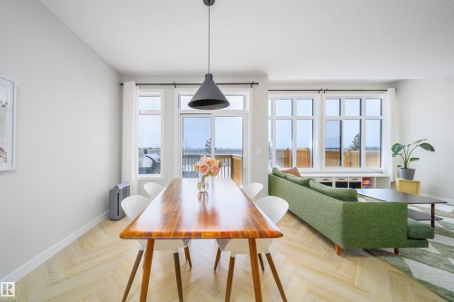 Dining space with baseboards and parquet flooring - 15 Chambery Crescent, St. Albert, AB - Indoor Photo Showing Dining Room