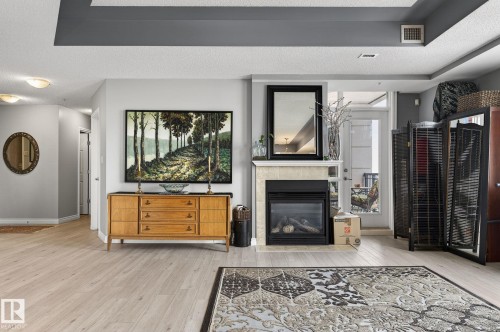 1703 9020 Jasper Avenue, Edmonton, AB - Indoor With Fireplace