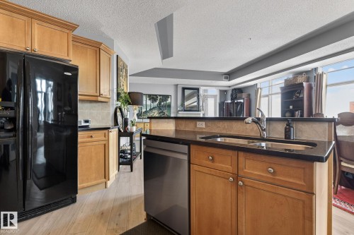 1703 9020 Jasper Avenue, Edmonton, AB - Indoor Photo Showing Kitchen With Double Sink