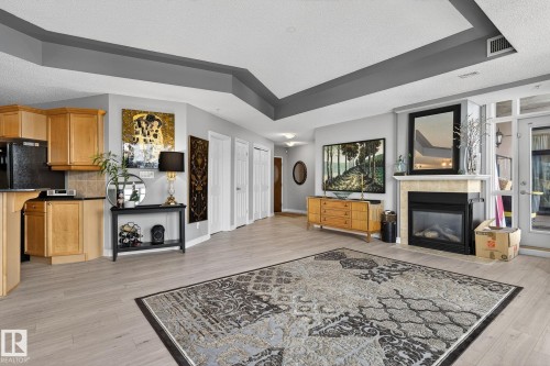 1703 9020 Jasper Avenue, Edmonton, AB - Indoor With Fireplace