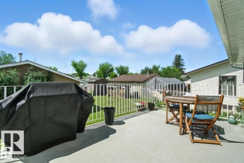 View of patio / terrace with a grill and outdoor dining area - 14936 81 Street, Edmonton, AB - Outdoor With Exterior