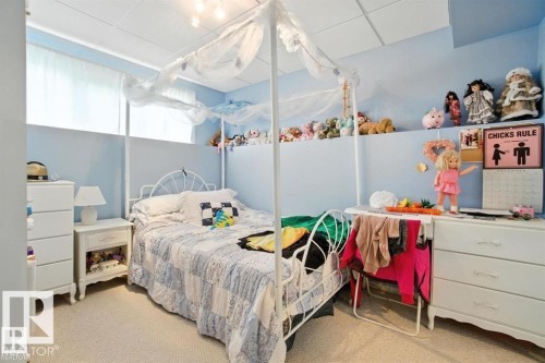 Bedroom with light carpet and a paneled ceiling - 14936 81 Street, Edmonton, AB - Indoor Photo Showing Bedroom