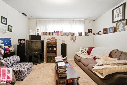 Living room featuring carpet flooring - 14936 81 Street, Edmonton, AB - Indoor