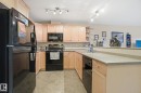 208 278 Suder Greens Drive Nw, Edmonton, AB  - Indoor Photo Showing Kitchen With Double Sink 