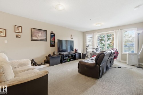 208 278 Suder Greens Drive Nw, Edmonton, AB - Indoor Photo Showing Living Room