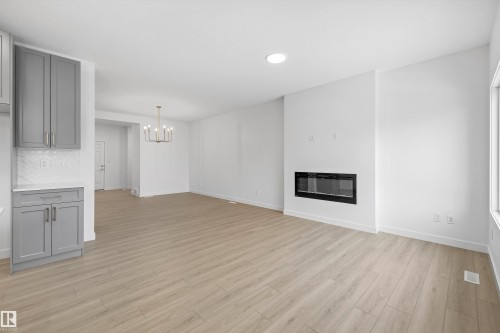 8728 183 Avenue, Edmonton, AB - Indoor Photo Showing Other Room With Fireplace