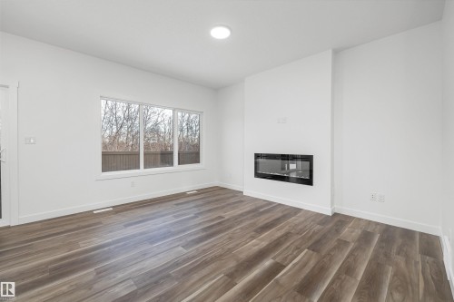 8724 183 Avenue, Edmonton, AB - Indoor Photo Showing Living Room With Fireplace