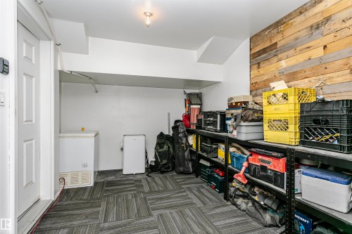 Basement den/flex-space off the garage - 4011 Orchards Drive, Edmonton, AB - Indoor Photo Showing Other Room