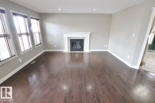 1416 56 Street, Edmonton, AB - Indoor Photo Showing Living Room With Fireplace