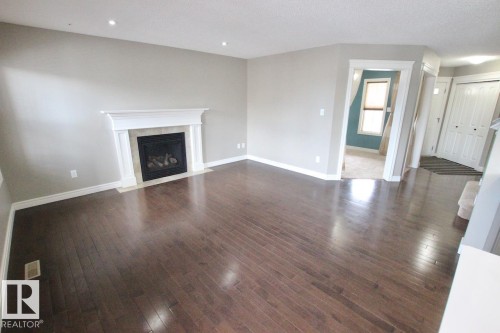 1416 56 Street, Edmonton, AB - Indoor Photo Showing Living Room With Fireplace
