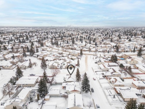 Snowy aerial view with a residential view - 17303 101 Street, Edmonton, AB - Outdoor With View