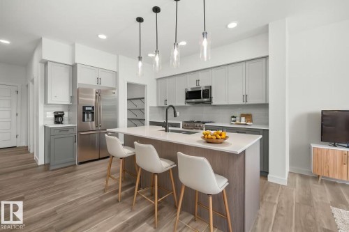 606 176 Avenue, Edmonton, AB - Indoor Photo Showing Kitchen With Double Sink With Upgraded Kitchen