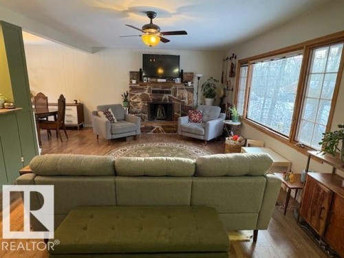 191 52343 Range Rd 211, Rural Strathcona County, AB - Indoor Photo Showing Living Room With Fireplace