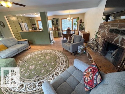 191 52343 Range Rd 211, Rural Strathcona County, AB - Indoor Photo Showing Living Room With Fireplace