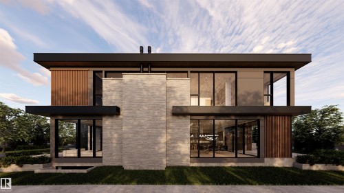 Rear view of house with stone siding and a lawn - 9804 143 Street, Edmonton, AB - Outdoor With Exterior