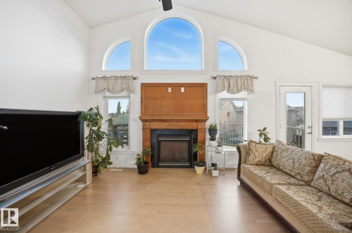 1324 70 Street, Edmonton, AB - Indoor Photo Showing Living Room With Fireplace