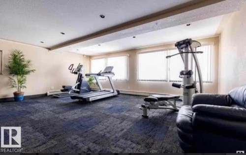 211 245 Edwards Dr Sw, Edmonton, AB - Indoor Photo Showing Gym Room