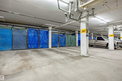 Underground Heated Parking - 132 6220 134 Avenue, Edmonton, AB - Indoor Photo Showing Garage