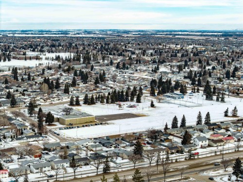 Snowy aerial view with a residential view - 132 6220 134 Avenue, Edmonton, AB - Outdoor With View