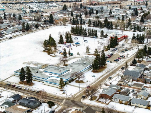 Snowy aerial view featuring a residential view - 132 6220 134 Avenue, Edmonton, AB - Outdoor With View