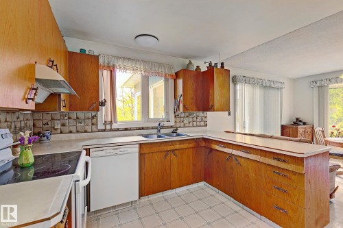 140 Windermere Drive, Edmonton, AB - Indoor Photo Showing Kitchen With Double Sink