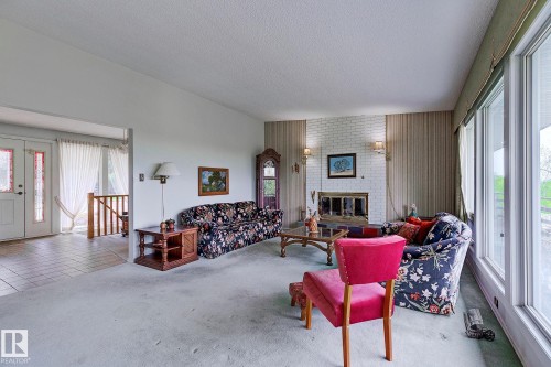 140 Windermere Drive, Edmonton, AB - Indoor Photo Showing Living Room With Fireplace