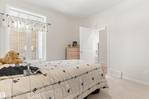 9 Butterworth Point(E), Edmonton, AB - Indoor Photo Showing Bedroom