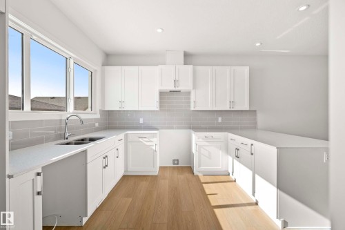 667 173 Avenue, Edmonton, AB - Indoor Photo Showing Kitchen With Double Sink