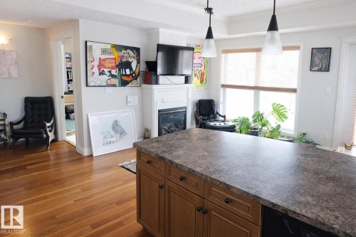 406 10232 115 Street, Edmonton, AB - Indoor With Fireplace