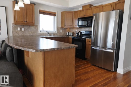 406 10232 115 Street, Edmonton, AB - Indoor Photo Showing Kitchen With Double Sink