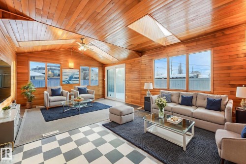 58 Huron Street S, Devon, AB - Indoor Photo Showing Living Room