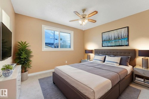 58 Huron Street S, Devon, AB - Indoor Photo Showing Bedroom