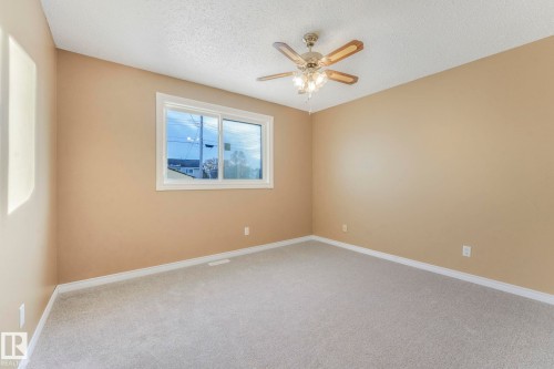 58 Huron Street S, Devon, AB - Indoor Photo Showing Other Room