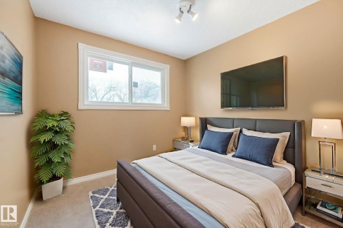 58 Huron Street S, Devon, AB - Indoor Photo Showing Bedroom